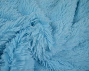 Langharig bont stof - Aqua blauw