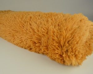 Langharig bont stof - Okergeel - Rol