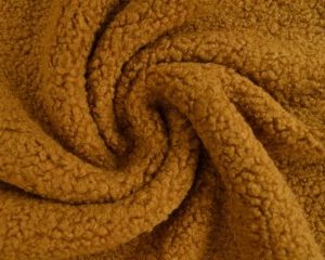 Teddy bont stof - Okergeel