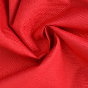 Rode waterafstotende canvas stof met grove weefstructuur, waterafstotend en geschikt voor afdekzeilen en outdoor