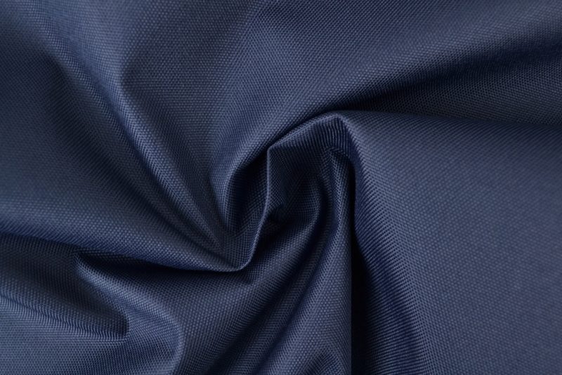 Marineblauw waterafstotende canvas stof met grove weefstructuur, waterafstotend en geschikt voor afdekzeilen en outdoor